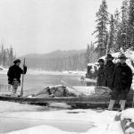 Surveyors on Lower Canyon of Upper Nechako River; surveyors are, Jack Braithwaite, George Coply, and Olaf Larson