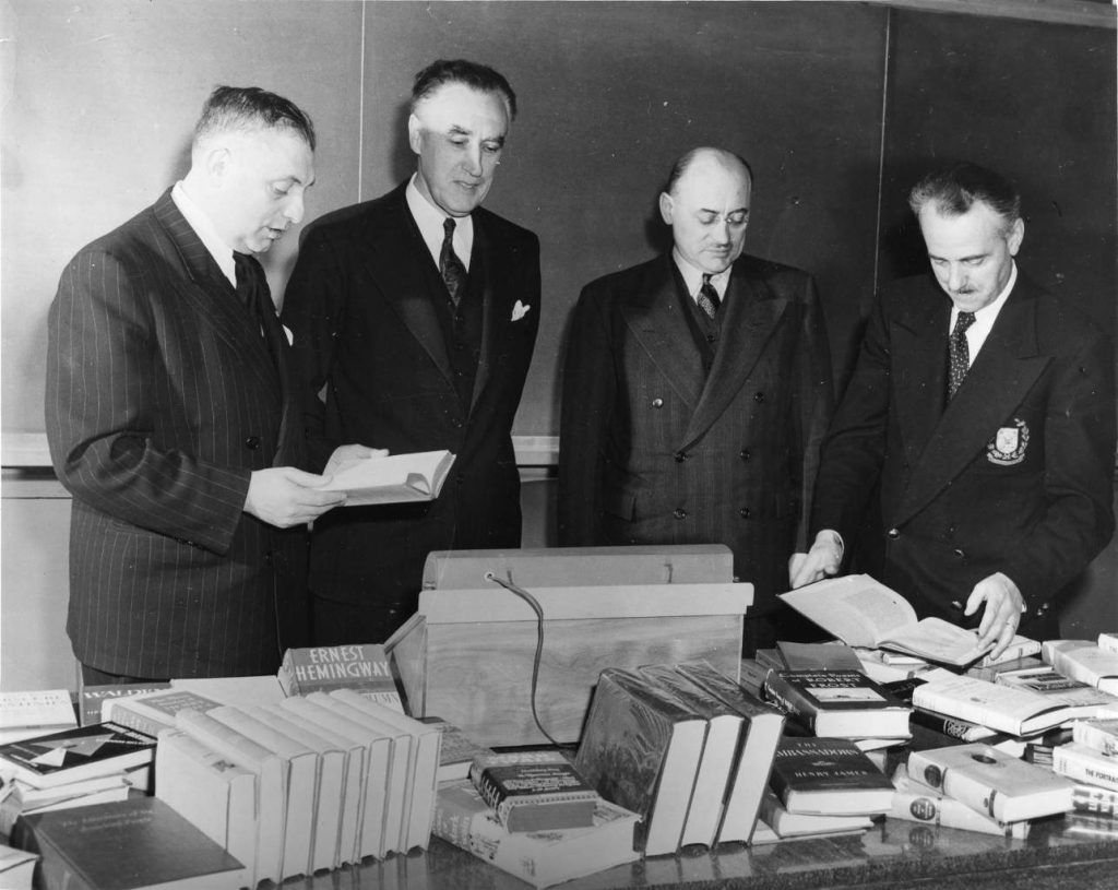 MM. Thomas Greenwood, Richard P. Butrick, Marcel Faribault et Raymond Tanghe. Archives UdeM, D0037/1fp,04745.
